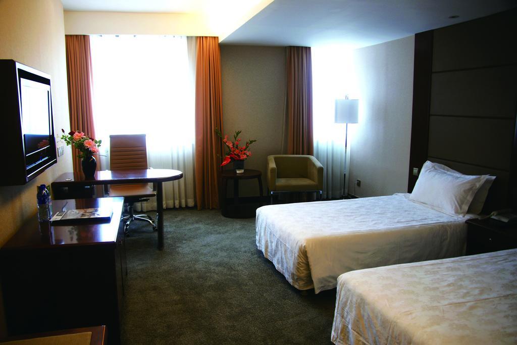 New Gloria Plaza Garden Hotel Harbin Room photo