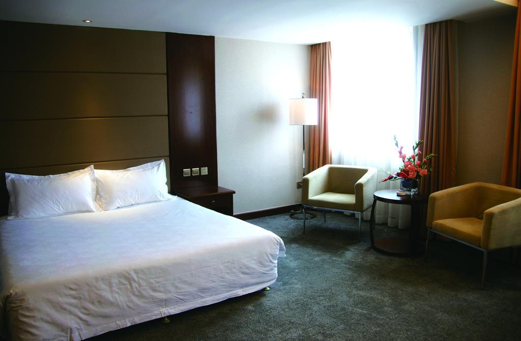 New Gloria Plaza Garden Hotel Harbin Exterior photo